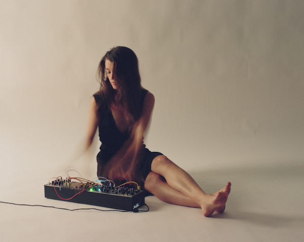 Julie Hill with a synthesizer.